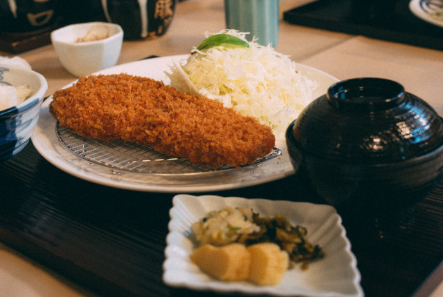 tonkatsu on a plate with cabbage