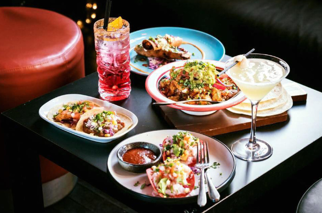 plates of mexican food on the table