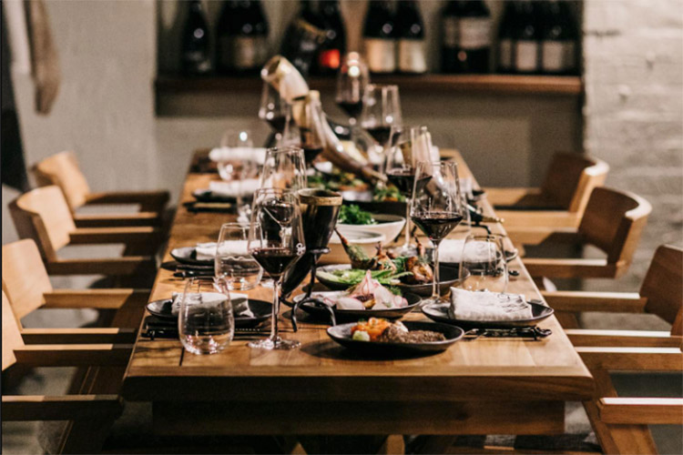 a banquet style dining table sitting in mjolner