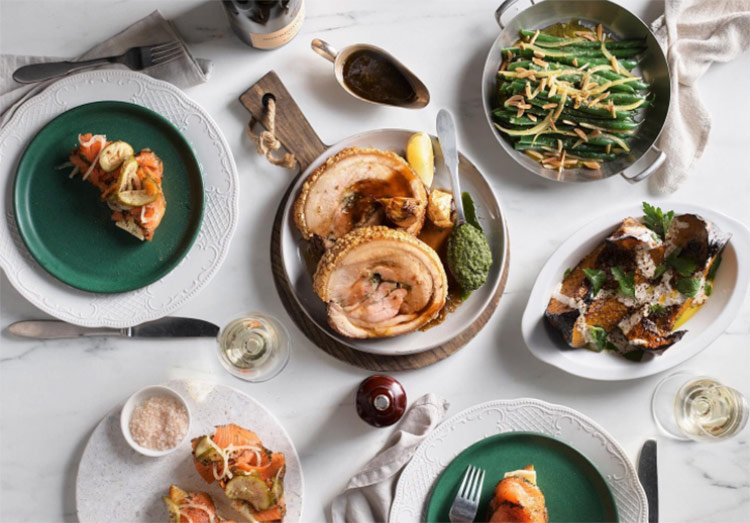 a selection of meals laid out on a table at bert's bar & brasserie restaurant